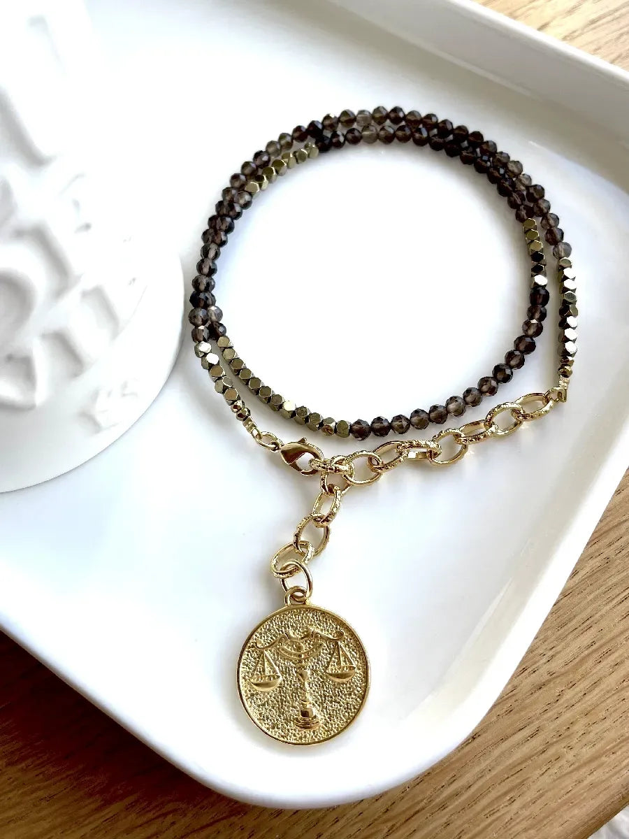collier balance quartz fumé