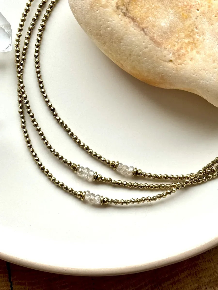 collier hématites or diamant