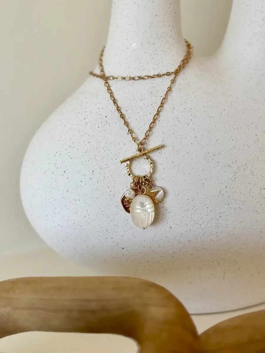 COLLIER TOGGLE SCARAB NACRE