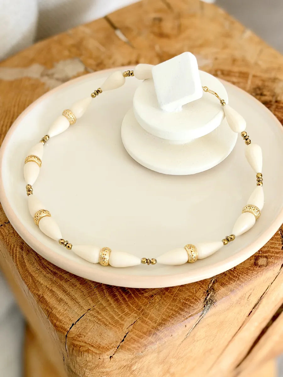 collier en bois fossile sultane rehaussées de zircons 