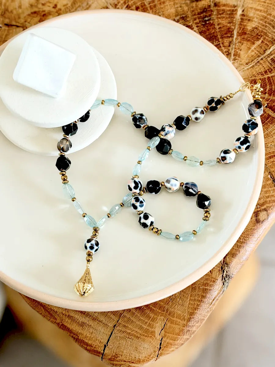 mala précieux en agate brésilienne et aigue marine repasse d'un pompon filigrane or 