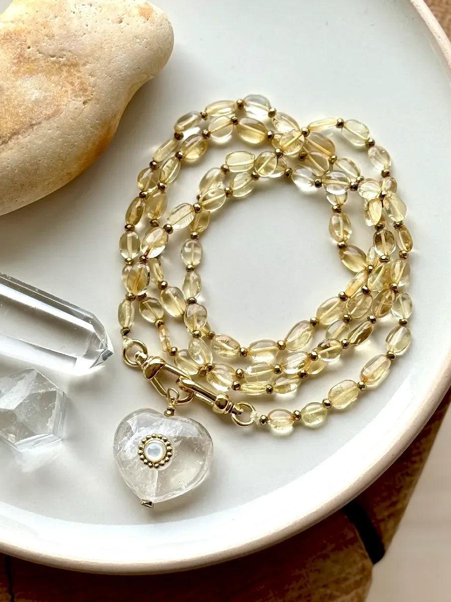 sautoir citrine pendentif coeur cristal de roche nacre